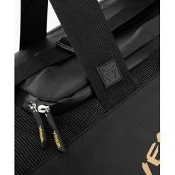 Venum Trainer Lite Evo Sports Bags Black-Gold -Boxing Shop venum trainer lite evo sports bags black gold 4 lg
